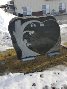 Polished rock monument with graphic by Grace Monuments